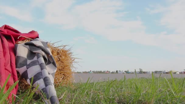 Two Flags Red Checkered Standing Bale Straw Waiting Judge Give — Stock Video