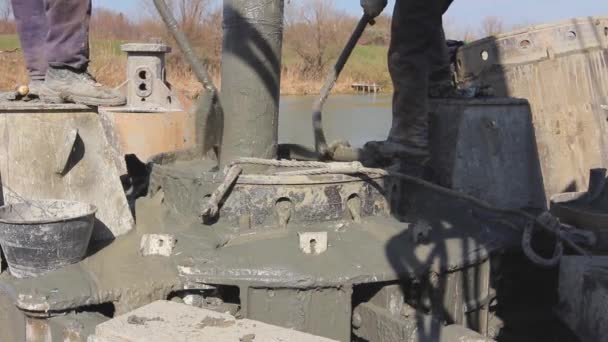 Riggers Workers Removing Surplus Liquid Smooth Concrete Construction Workers Using — Stock Video