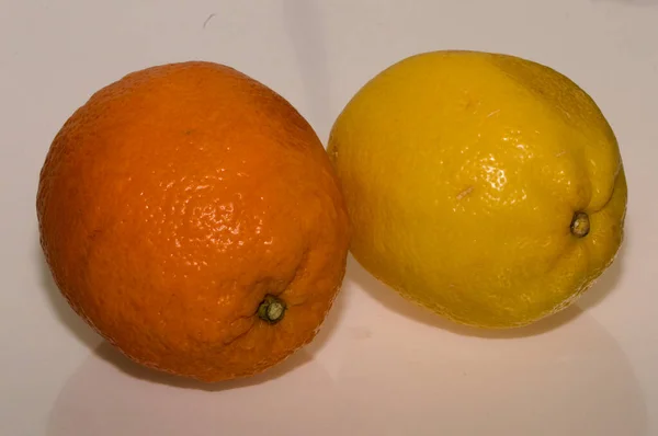 orange and lemon on a white background