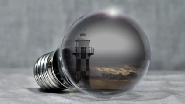 Lighthouse pear light bulb sea — Stock Video