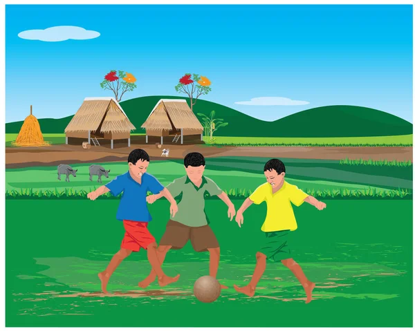 Çocuklar bahçede çamurda futbol oynuyorlar.