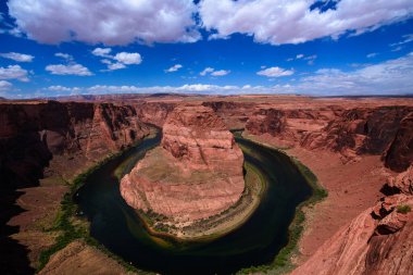 The colorado river meander at the horseshoe bend clipart