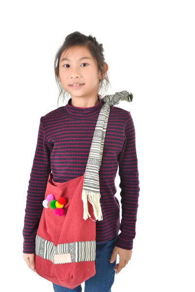 Asian girl holding red fabric bag over white background — Stock Photo, Image