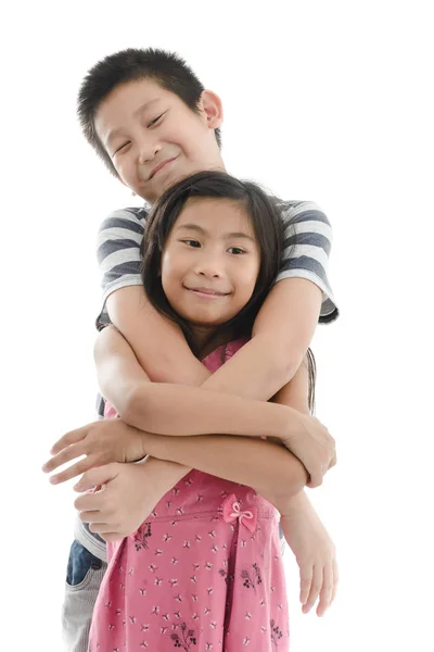 Sister and Brother against White Background — Stock Photo, Image