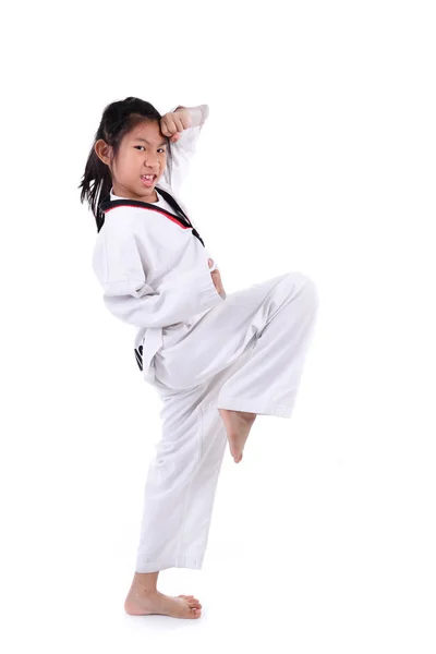 Dziewczyna azjatyckich taekwondo na tle. — Zdjęcie stockowe