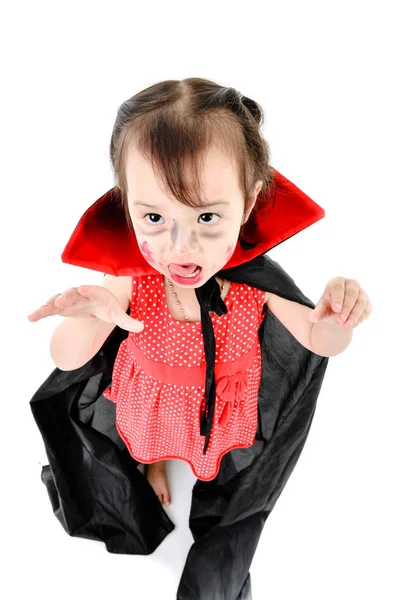 Asian girl with halloween costume on white. — Stock Photo, Image