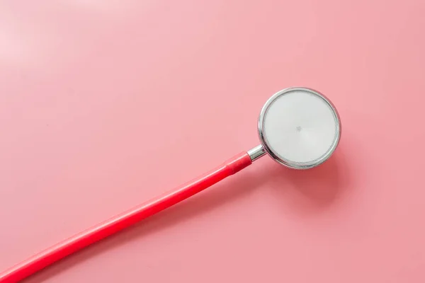 Stethoscope on pink background. — Stock Photo, Image