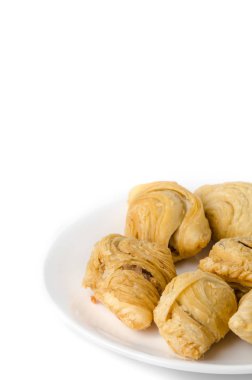 Köri puf boşaltmak ile beyaz çanak üzerinde