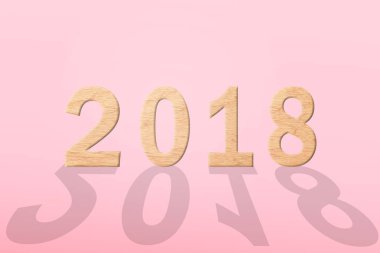 Pembe bir arka plan ile soyut ahşap 2018