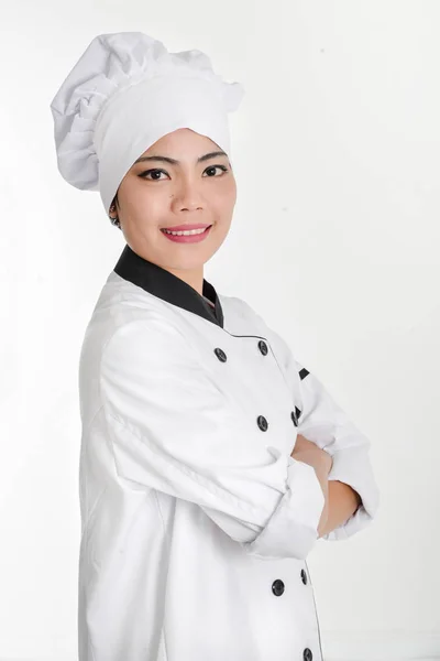 Retrato de una joven chef aislada —  Fotos de Stock