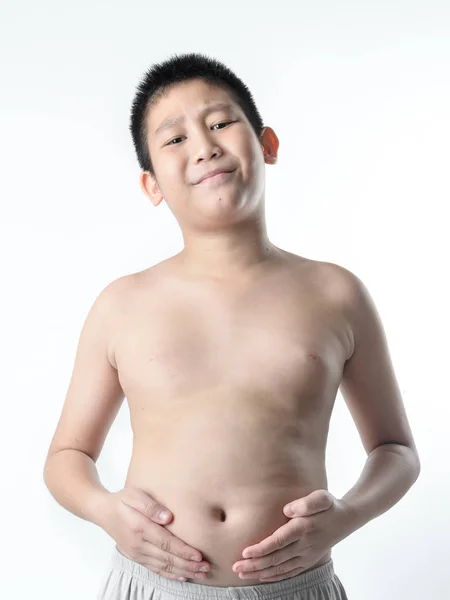 Pojke med tjock mage på vit bakgrund. — Stockfoto