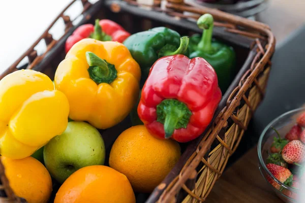 Chilli peppers and vegetables in basket, healthy food concept. — Stock Photo, Image