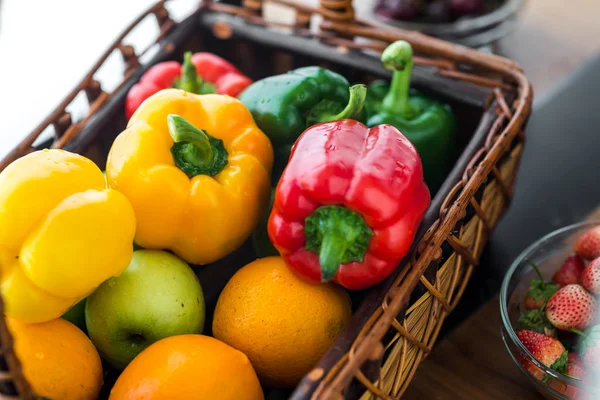 Chilli peppers and vegetables in basket, healthy food concept. — Stock Photo, Image