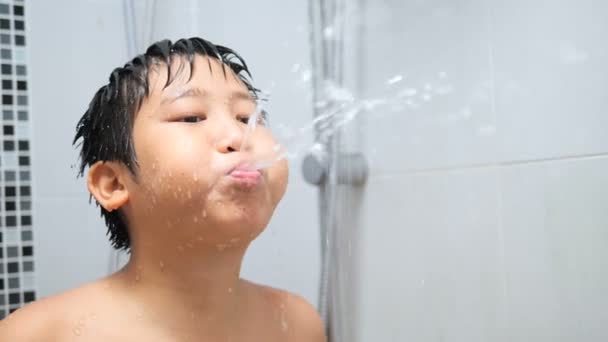 Asian Preteen Boy Spraying Water His Mouth While Take Shower — Stockvideo