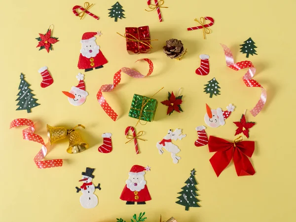 Christmas objects on yellow background. — Stock Photo, Image