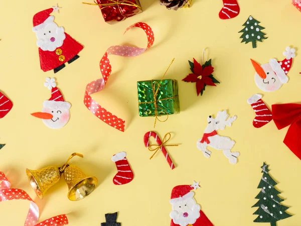 Christmas objects on yellow background. — Stock Photo, Image