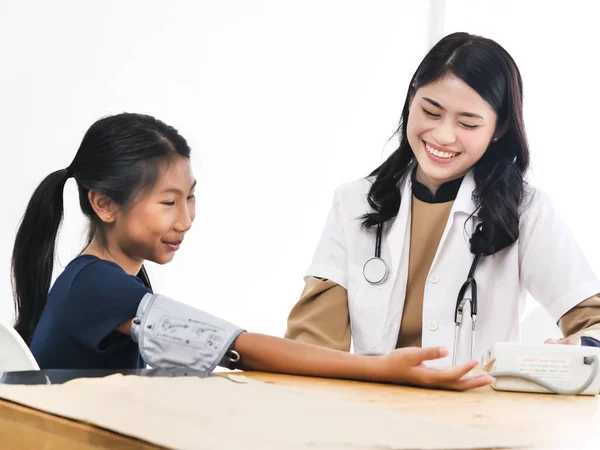 Asian Female Doctor White Coat Measures Pressure Child Nurse Doing — Stock Photo, Image