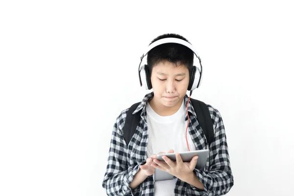 Happy Asian Schooljongen Met Behulp Van Hoofdtelefoon Tablet Lifestyle Concept — Stockfoto