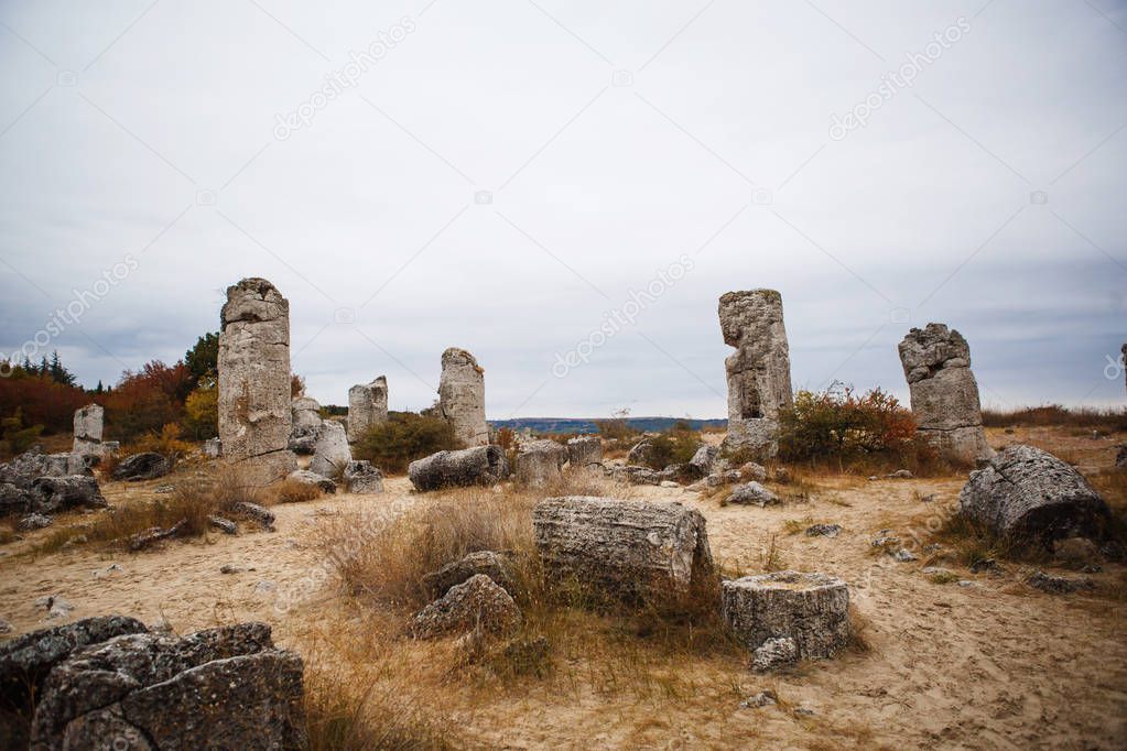 Stone ruins and pillars of stone on a large stone field. The attraction of Bulgaria in Varna - Pobiti Kamani