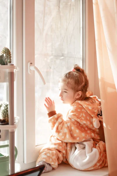 Little Girl Plush Pajamas Hood Plays Window Curtain Girl Walks — Stock Photo, Image