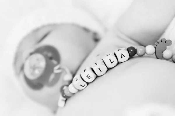 Baby Girl Named Leila Sleeping Wearing Wooden Pacifier Chain — Stock Photo, Image