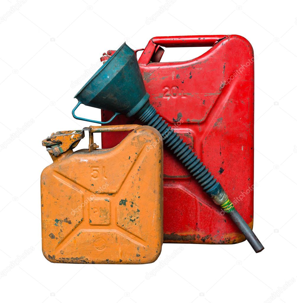 Old red and orange metal fuel tank for transporting and storing petrol with a funnel for fuel. Isolated  on a white background with clipping path