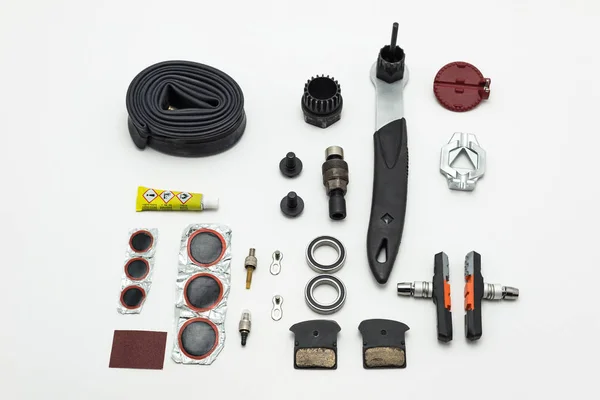 Repairing of bicycle. Tools, parts and equipment set. Isolated on a white background.
