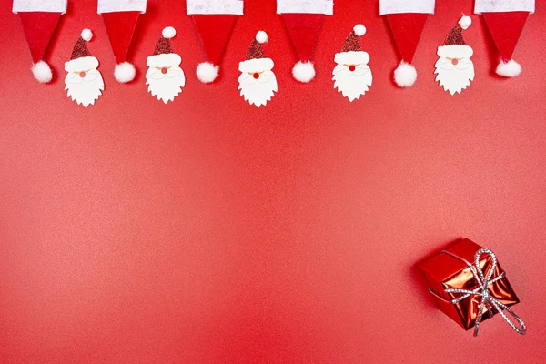 Santa Claus Hats Santa Claus Faces Made Material Arranged Row — Stock Photo, Image