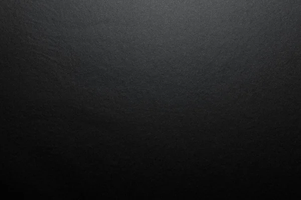 Černé Pozadí Pravého Černého Papíru Matnou Vláknitou Strukturou Osvětlené Měkkým — Stock fotografie