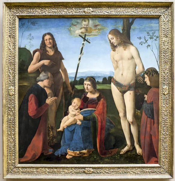 The Virgin and Child with St. John the Baptist and St. Sebastian — Stock Photo, Image