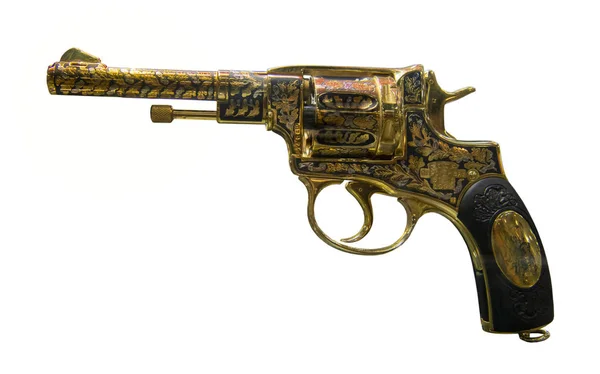 Golden revolver of the Nagan system, made in 1928. Isolated on — Stock Photo, Image