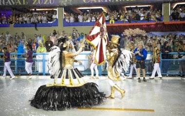 Rio de Janeiro, Brasil-  February 29, 2020: Samba Parade at the 2020 Carnival, Champions Parade, Sambodromo. It's raining