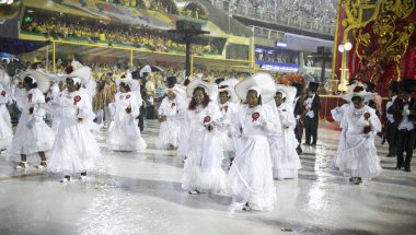 Rio de Janeiro, Brasil-  February 29, 2020: Samba Parade at the 2020 Carnival, Champions Parade, Sambodromo. It's raining