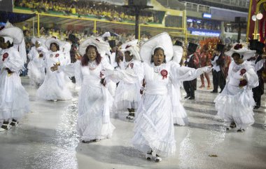 Rio de Janeiro, Brasil-  February 29, 2020: Samba Parade at the 2020 Carnival, Champions Parade, Sambodromo. It's raining