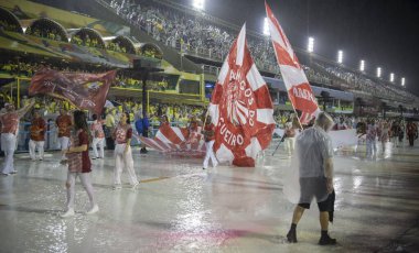 Rio de Janeiro, Brasil-  February 29, 2020: Samba Parade at the 2020 Carnival,Champions Parade, Sambodromo. It's raining