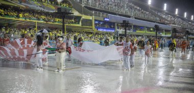 Rio de Janeiro, Brasil-  February 29, 2020: Samba Parade at the 2020 Carnival,Champions Parade, Sambodromo. It's raining