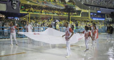 Rio de Janeiro, Brasil-  February 29, 2020: Samba Parade at the 2020 Carnival,Champions Parade, Sambodromo. It's raining