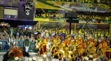 Rio de Janeiro, Brasil-  February 29, 2020: Samba Parade at the 2020 Carnival, Champions Parade, Sambodromo. It's raining