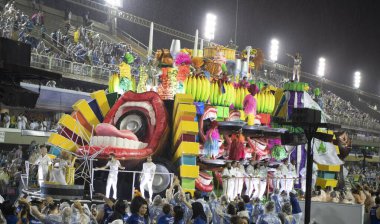 Rio de Janeiro, Brasil-  February 29, 2020: Samba Parade at the 2020 Carnival,Champions Parade, Sambodromo. It's raining