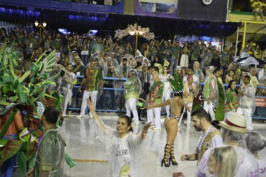 Rio de Janeiro, Brasil-  February 29, 2020: Samba Parade at the 2020 Carnival, Champions Parade, Sambodromo. It's raining