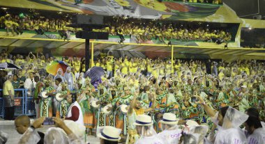 Rio de Janeiro, Brasil-  February 29, 2020: Samba Parade at the 2020 Carnival, Champions Parade, Sambodromo. It's raining
