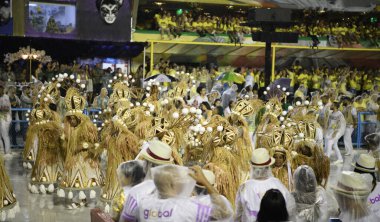 Rio de Janeiro, Brasil-  February 29, 2020: Samba Parade at the 2020 Carnival, Champions Parade, Sambodromo. It's raining