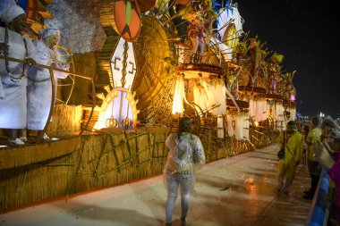 Rio de Janeiro, Brasil-  February 29, 2020: Samba Parade at the 2020 Carnival, Champions Parade, Sambodromo. It's raining
