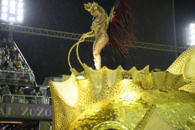 Rio de Janeiro, Brasil-  February 29, 2020: Samba Parade at the 2020 Carnival, Champions Parade, Sambodromo. It's raining