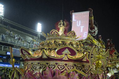 Rio de Janeiro, Brasil-  February 29, 2020: Samba Parade at the 2020 Carnival, Champions Parade, Sambodromo. It's raining