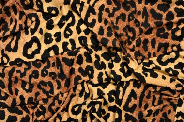 kahverengi ve siyah leopar deseni.