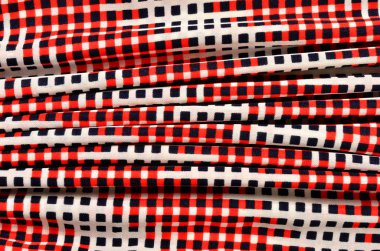 Küçük kareler desen buruşuk kumaş üzerine.