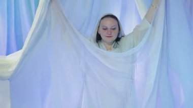 Jewish girl dancing before the wedding dance to attract good luck