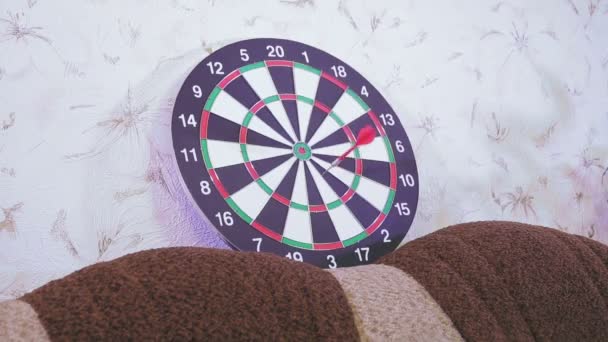 Family quarantined for the prevention of coronavirus, play darts in their free time at home — Stock Video