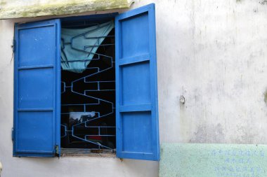 Bir evin etrafında Hoi mavi pencere bir, Danang, Vietnam